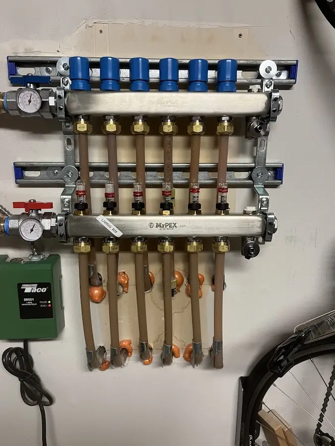 Plumber performing Water Heater Repair at a residential property in Fort Pierce